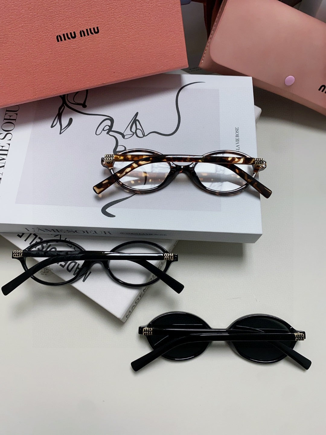 Miu Miu Round Black Lens Sunglasses for Men & Women - detail image 8