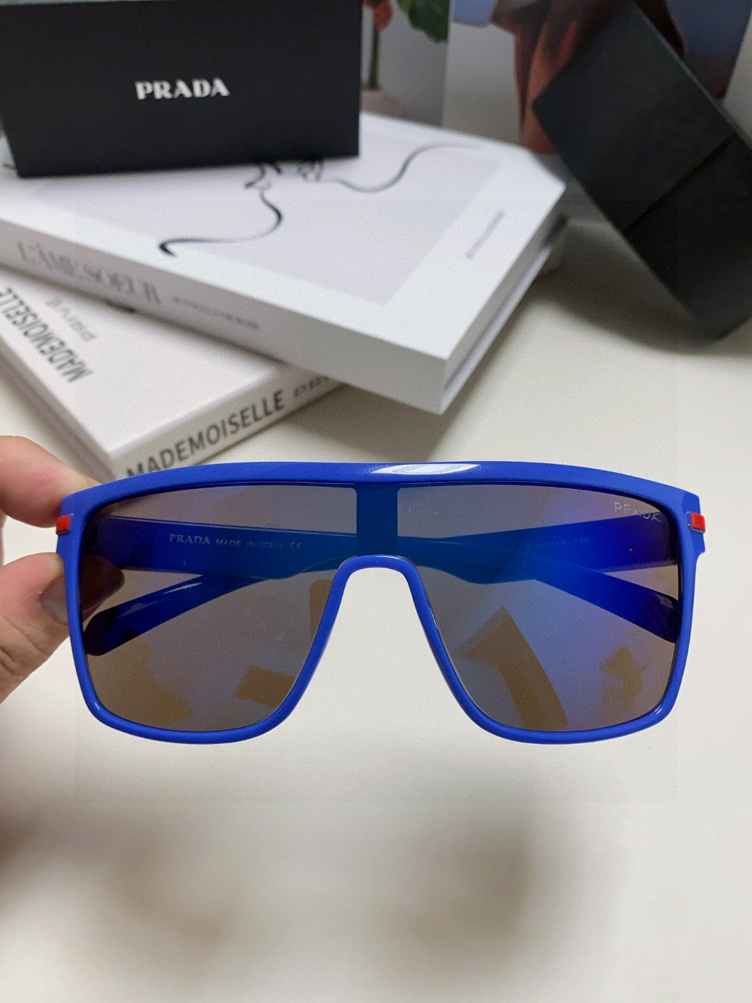 Prada Polarized Oversized Blue Lens Sunglasses for Men & Women - detail image 3