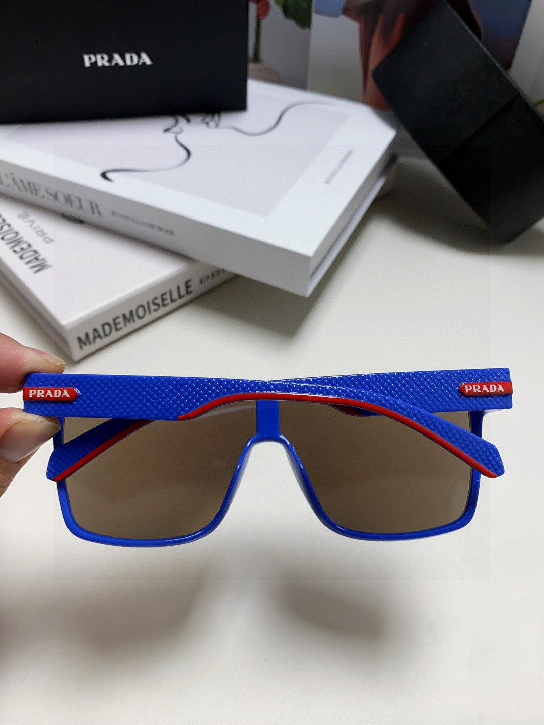 Prada Polarized Oversized Blue Lens Sunglasses for Men & Women - detail image 4