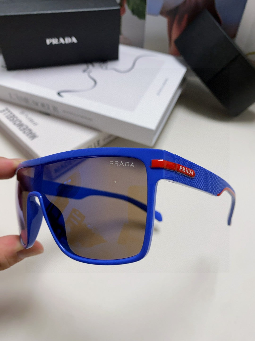 Prada Polarized Oversized Blue Lens Sunglasses for Men & Women - detail image 5