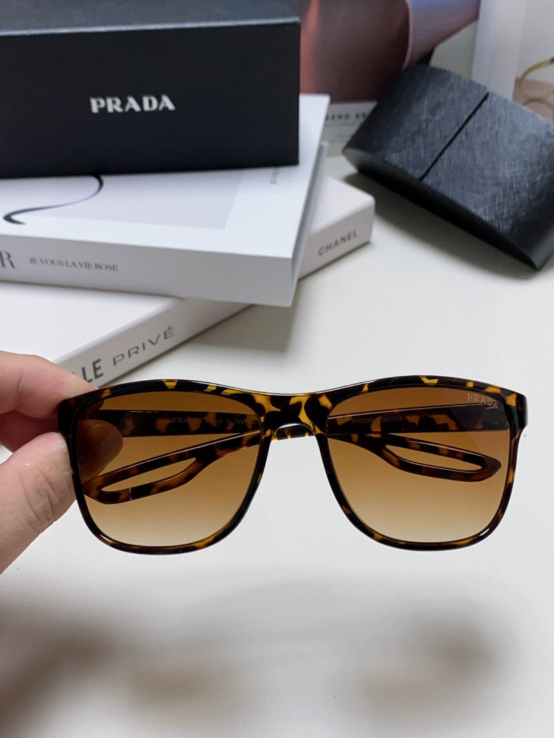 Prada Polarized Fashion Brown Lens Sunglasses for Men & Women - detail image 3