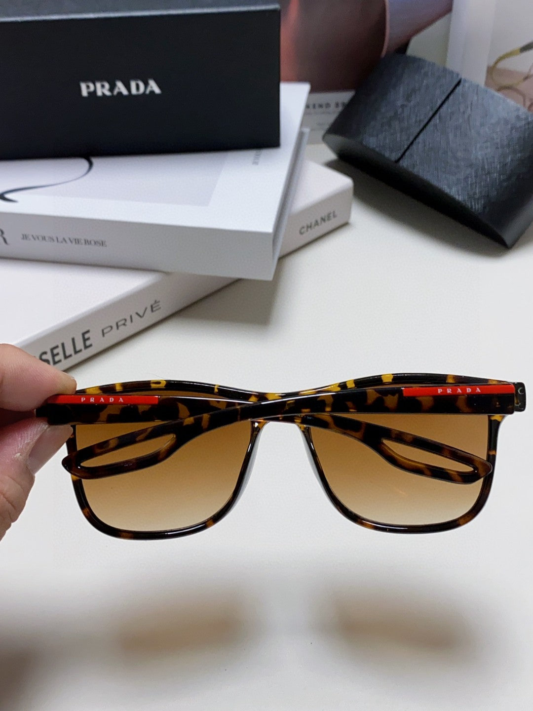 Prada Polarized Fashion Brown Lens Sunglasses for Men & Women - detail image 4