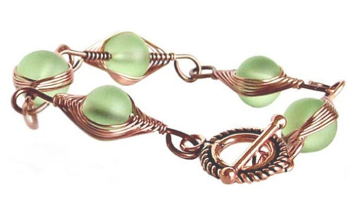 Artisan bracelet antiqued copper cultured SEA GLASS wire-wrapped . 10mm round beads & toggle clasp - green