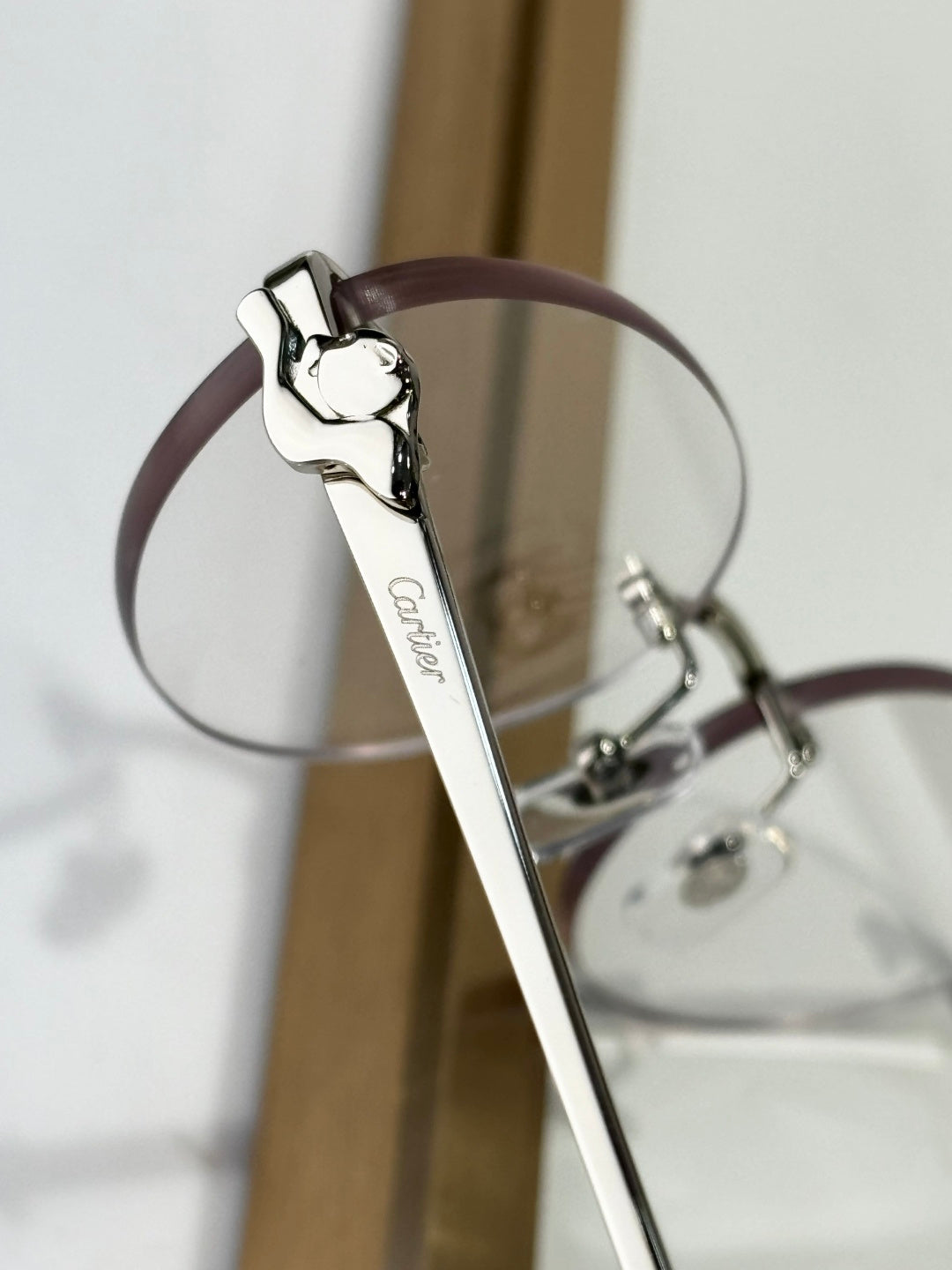 Cartier CT0504S Lightweight Rimless Red Lens Sunglasses for Men & Women - detail image 4