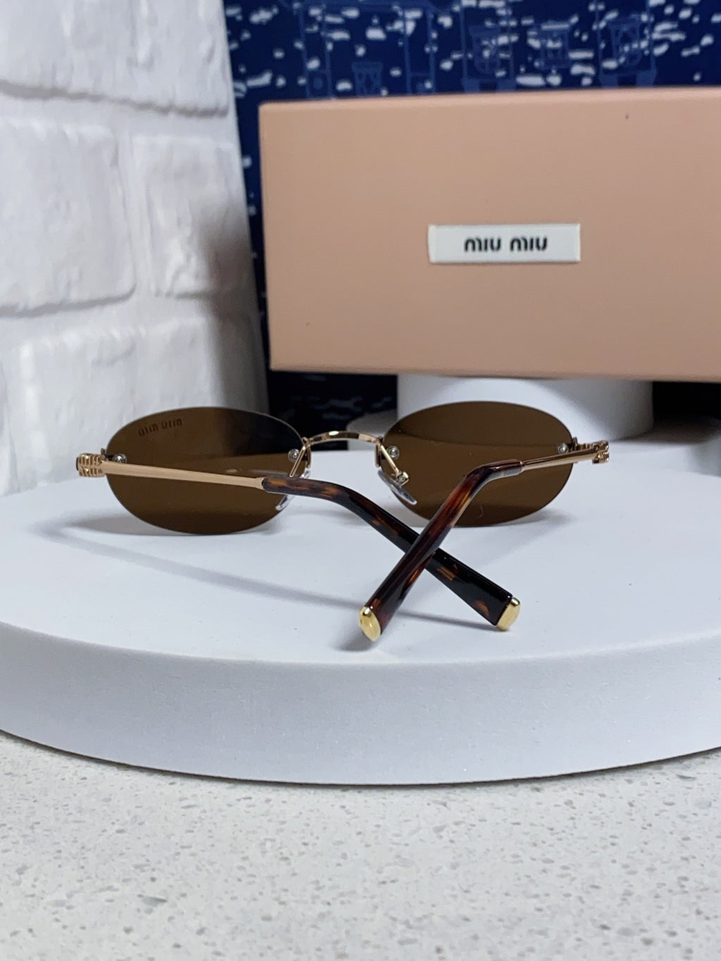 Miu Miu Lightweight Metal Rimless Brown Lens Sunglasses for Women - detail image 3