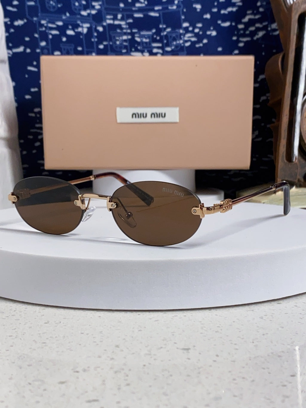 Miu Miu Lightweight Metal Rimless Brown Lens Sunglasses for Women