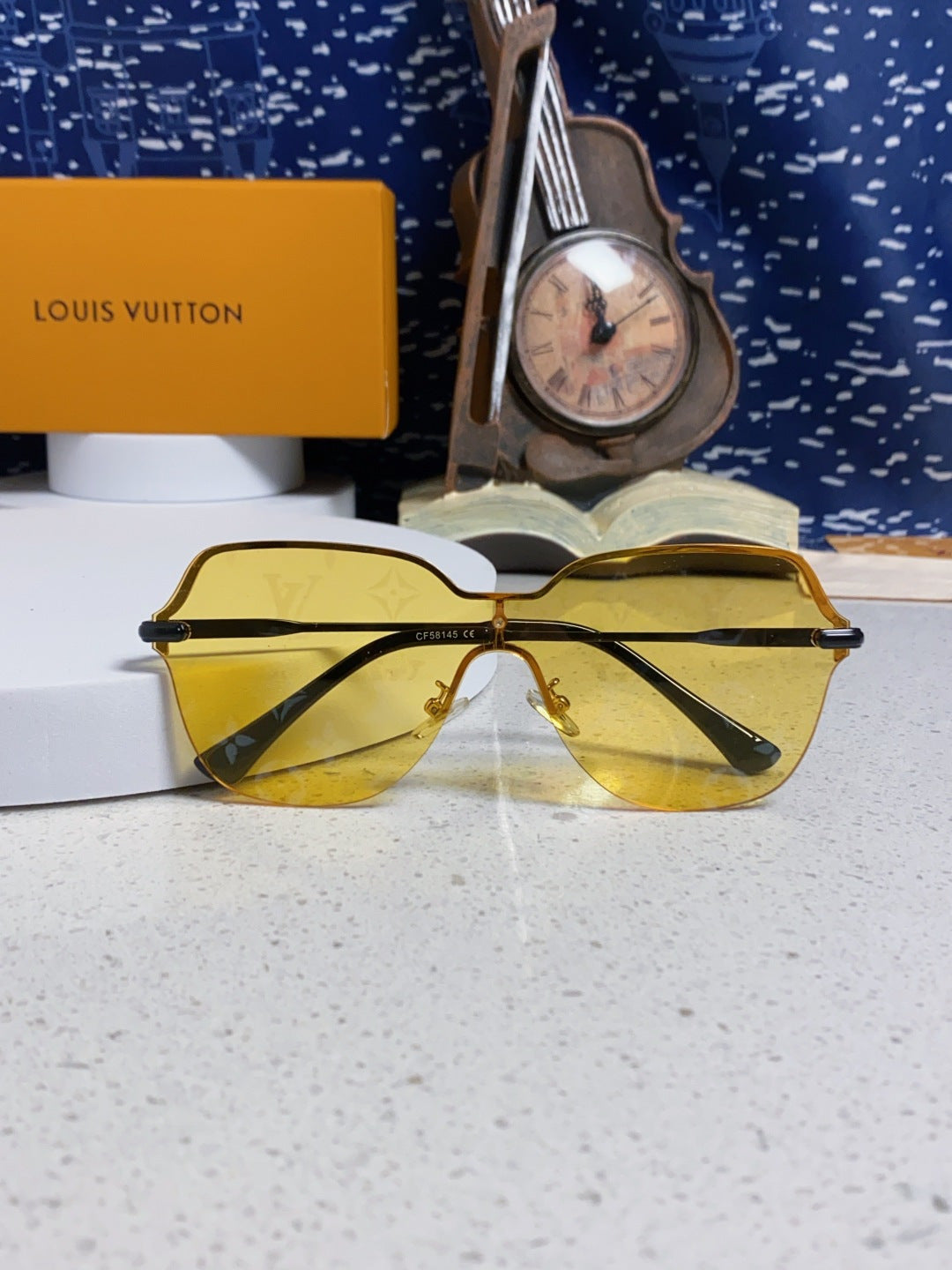 Louis Vuitton Lightweight Rimless Orange Lens Sunglasses for Women - detail image 7