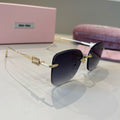 Miu Miu Lightweight Rimless Silver Lens Sunglasses for Women - 372413