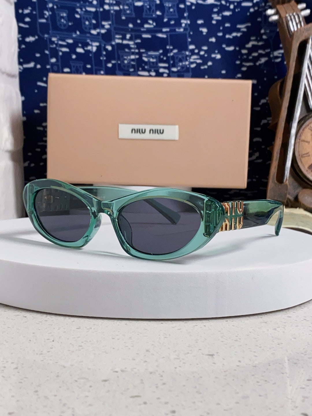 Miu Miu Cat-Eye Blue Lens Sunglasses for Men & Women - 358707