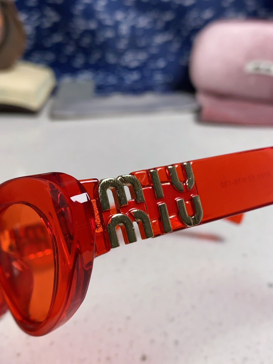Miu Miu Cat-Eye Red Lens Sunglasses for Men & Women - detail image 7