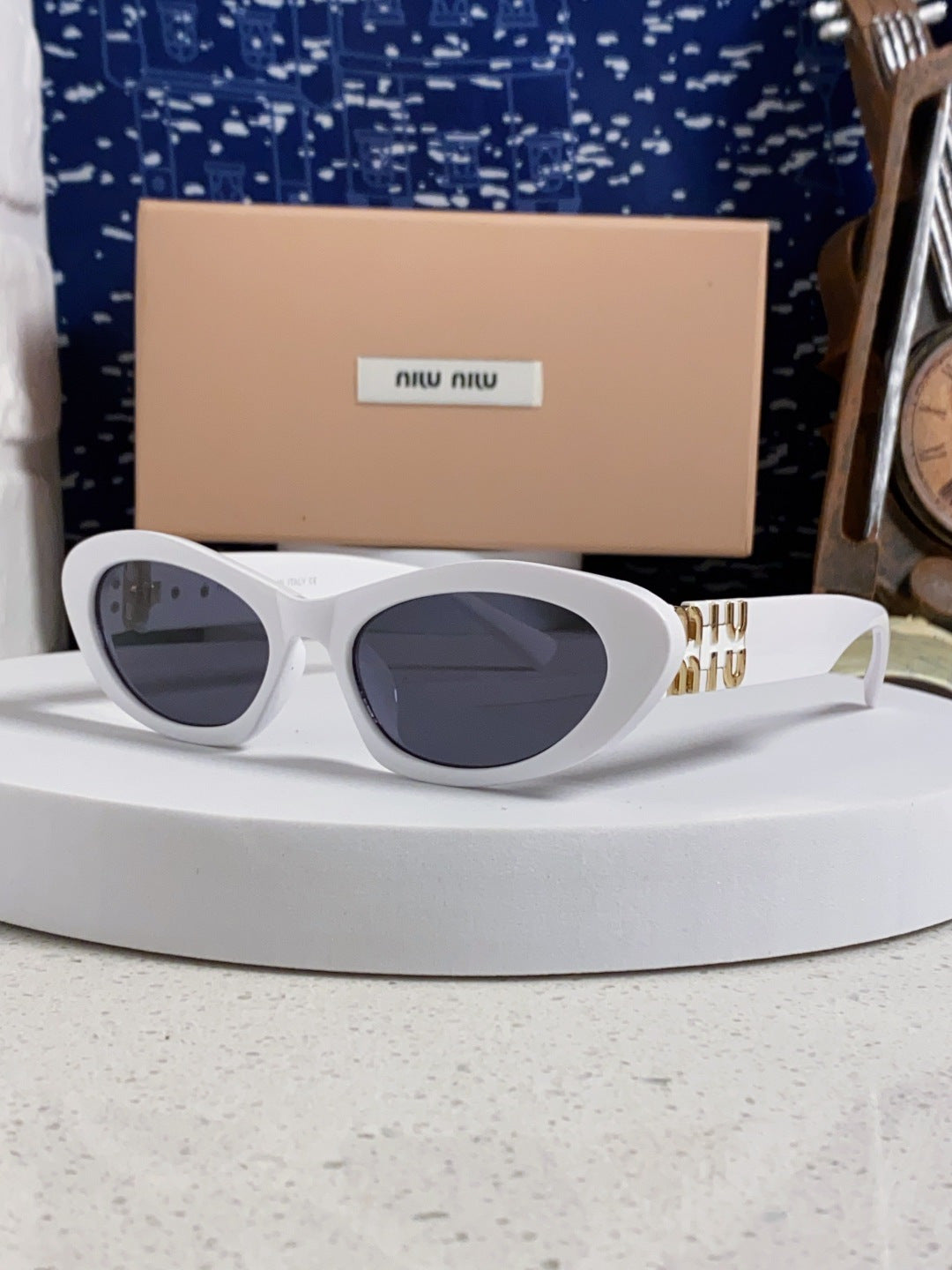 Miu Miu Cat-Eye Silver Lens Sunglasses for Men & Women - 358703