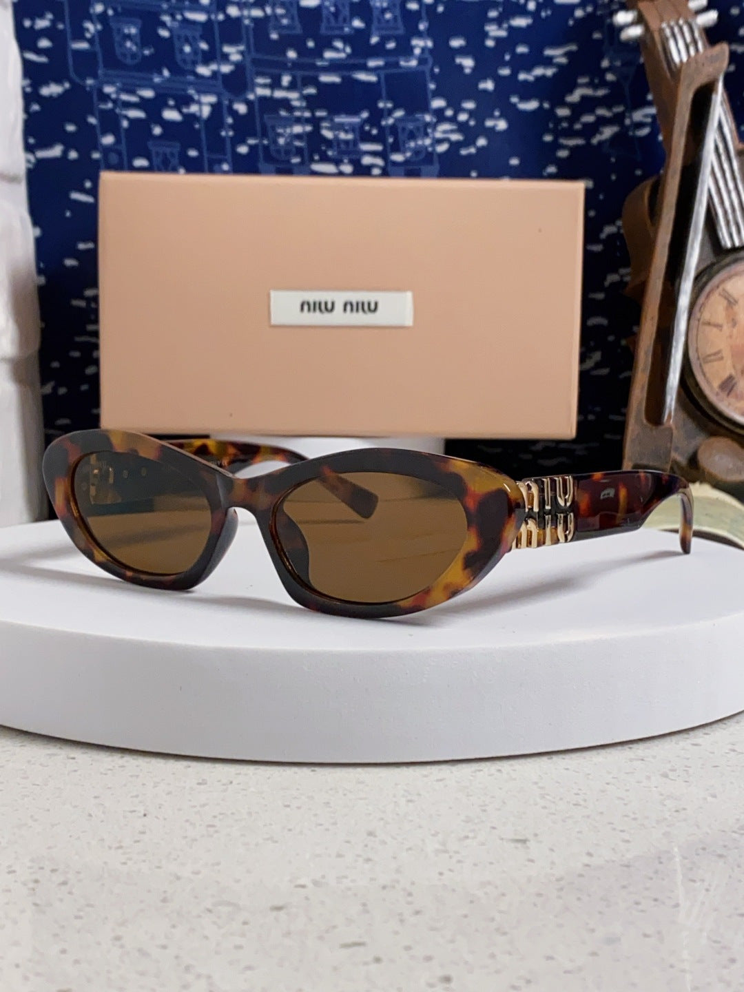 Miu Miu Cat-Eye Brown Lens Sunglasses for Men & Women - 358704