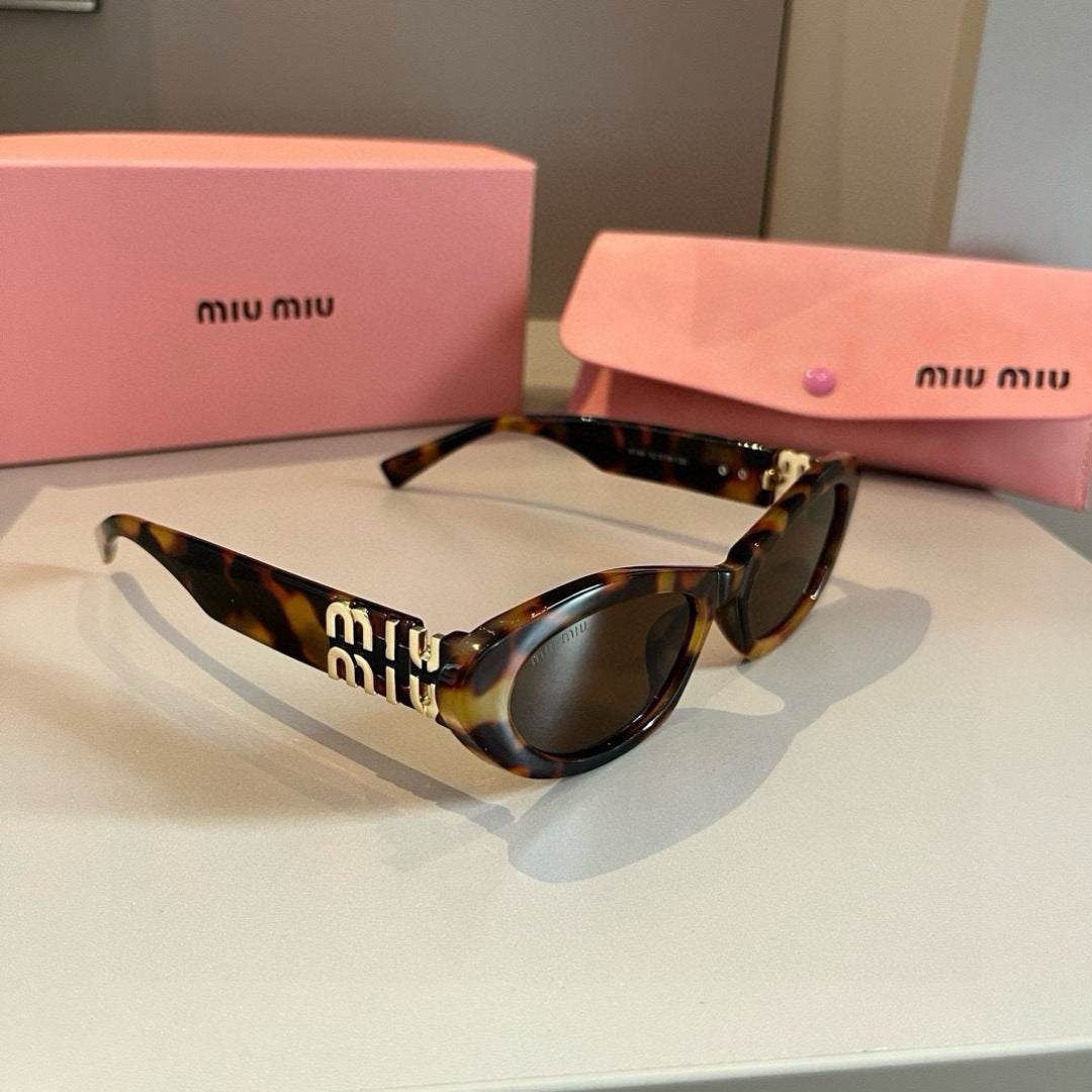 Miu Miu Cat-Eye Gold Lens Sunglasses for Men & Women - 358735