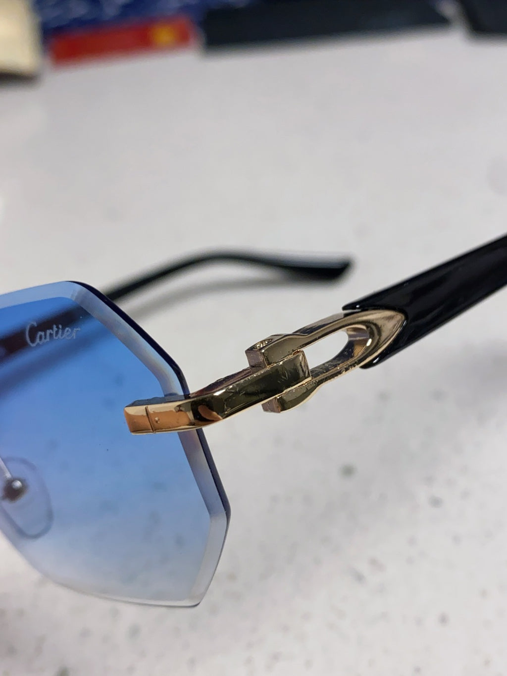 Cartier Lightweight Rimless Blue Lens Sunglasses for Men & Women - 382862 - detail image 7
