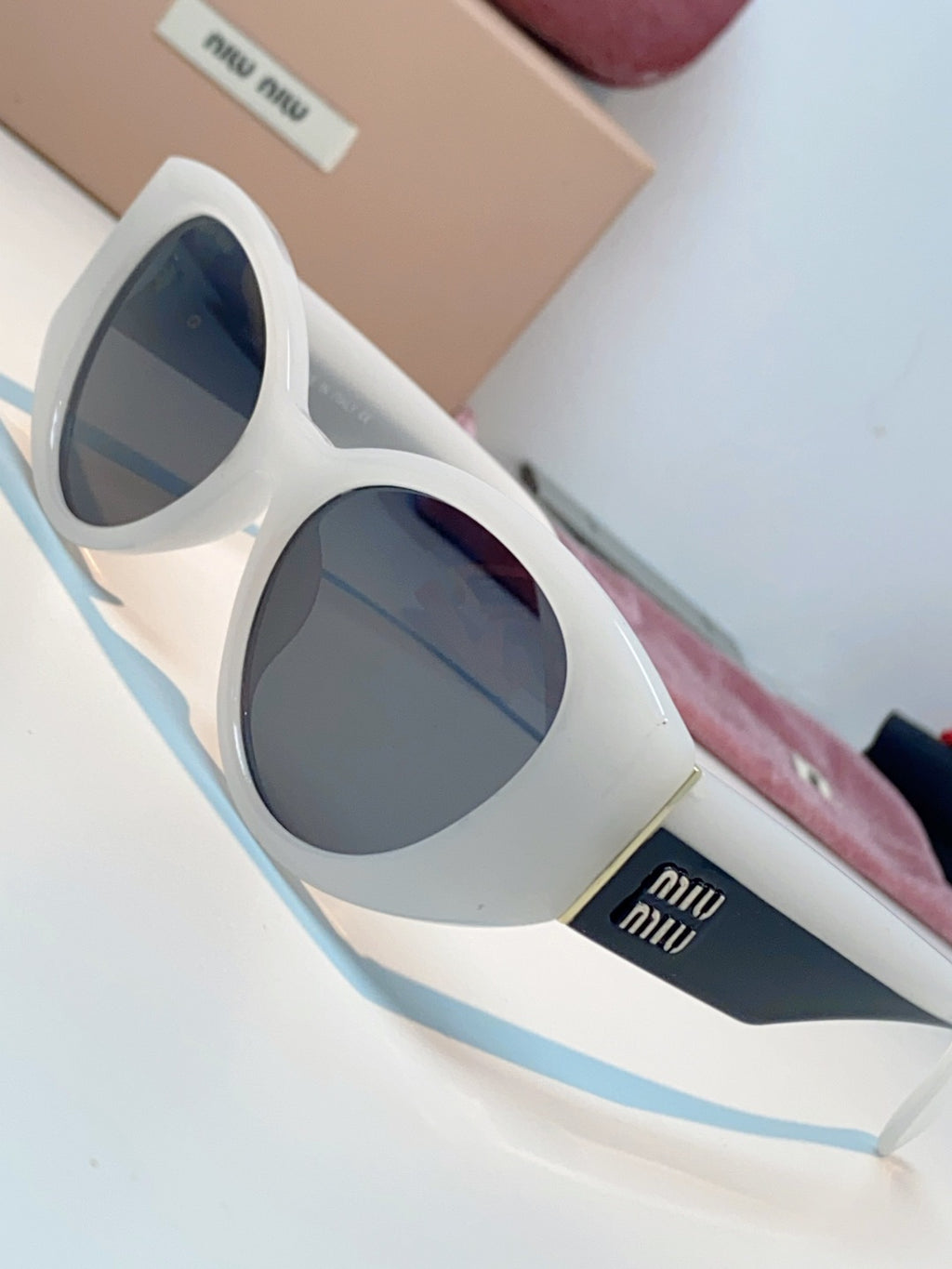 Miu Miu Polarized Cat-Eye Gray Lens Sunglasses for Men & Women - detail image 7