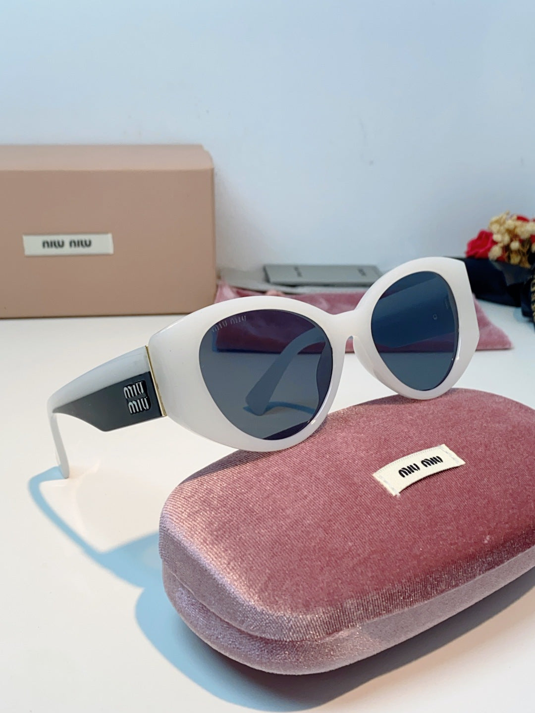 Miu Miu Polarized Cat-Eye Gray Lens Sunglasses for Men & Women - detail image 10