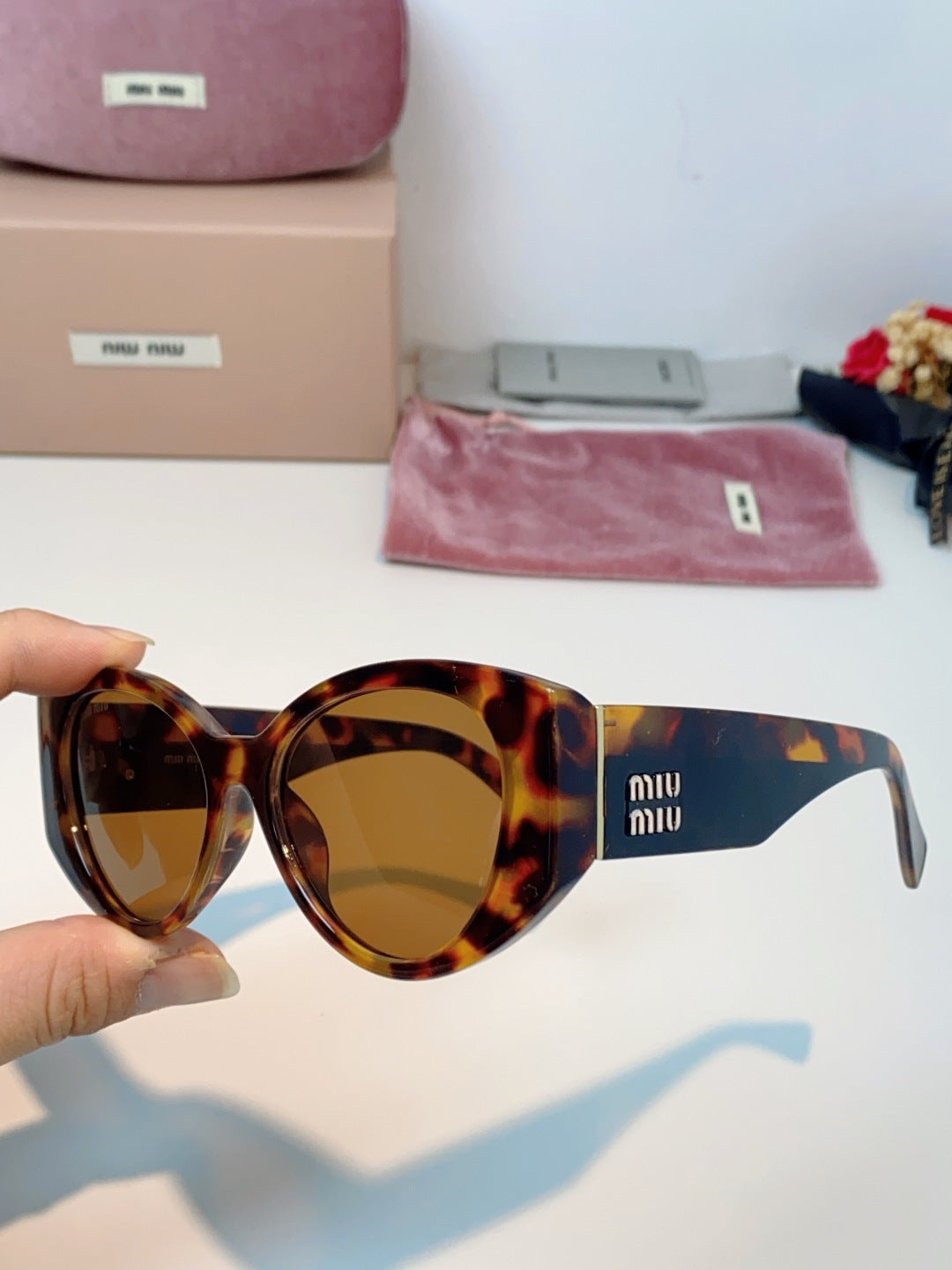 Miu Miu Polarized Cat-Eye Brown Lens Sunglasses for Men & Women - detail image 6