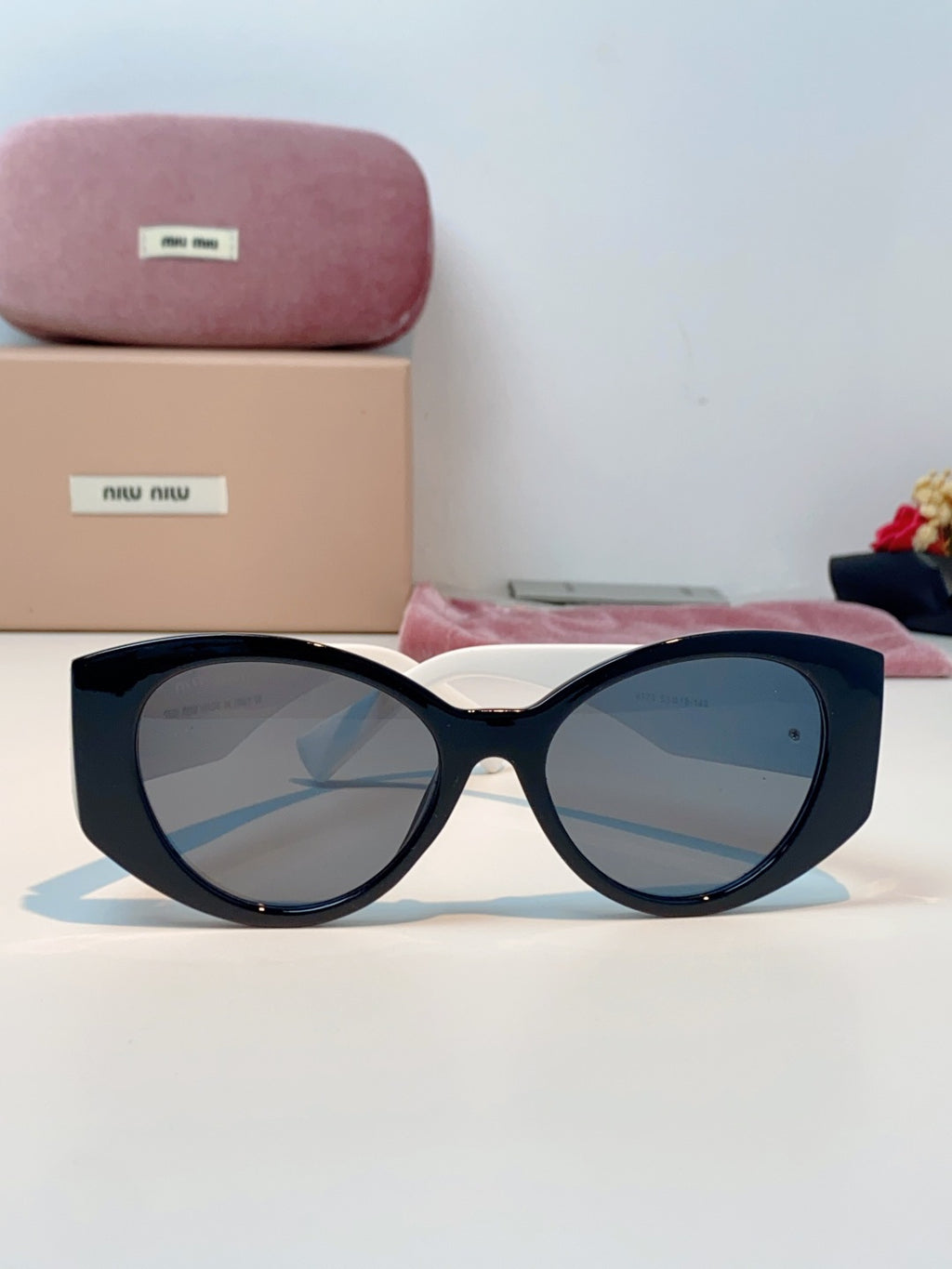 Miu Miu Polarized Cat-Eye Blue Lens Sunglasses for Men & Women - detail image 2