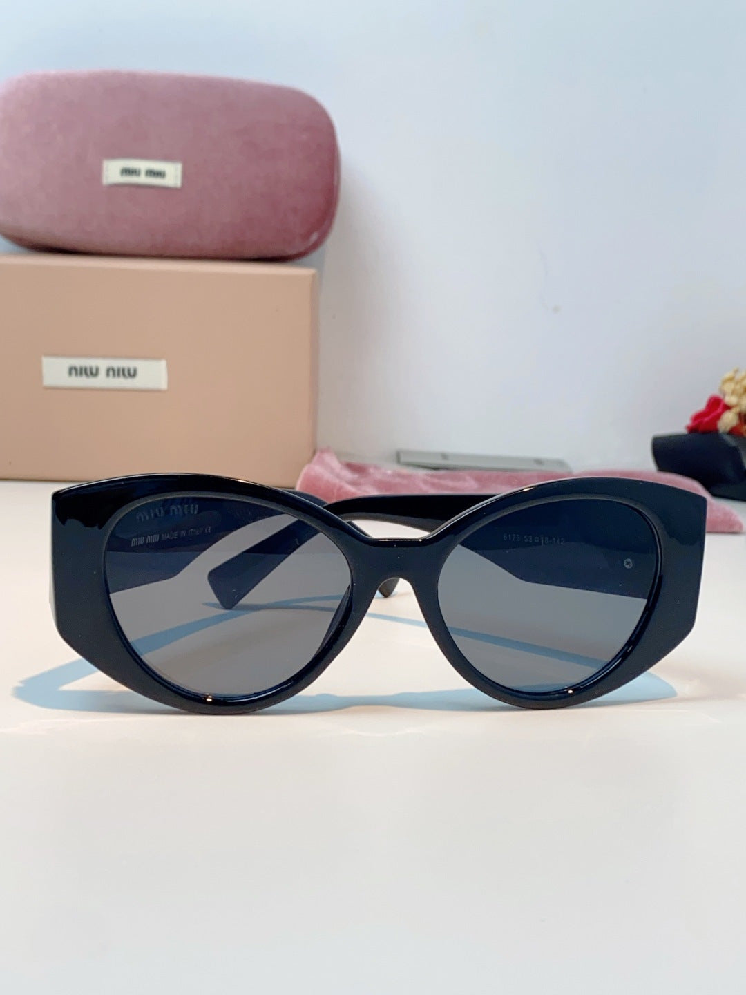 Miu Miu Polarized Cat-Eye Black Lens Sunglasses for Men & Women - detail image 2