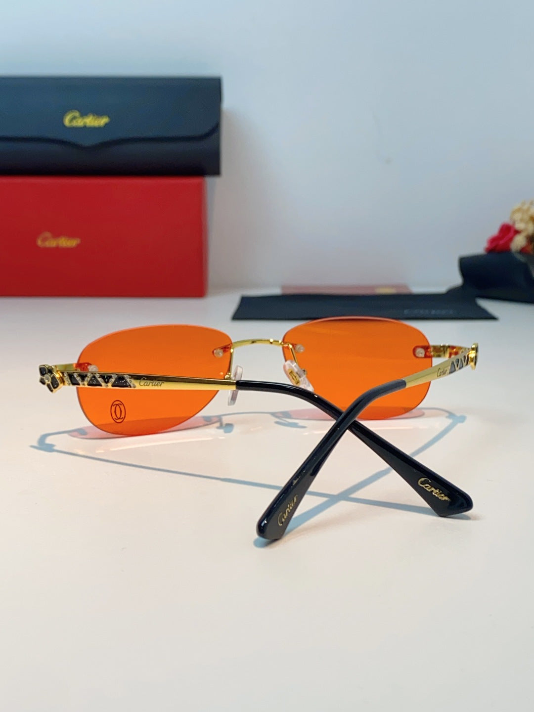 Cartier Lightweight Rimless Orange Lens Sunglasses for Men & Women - detail image 3