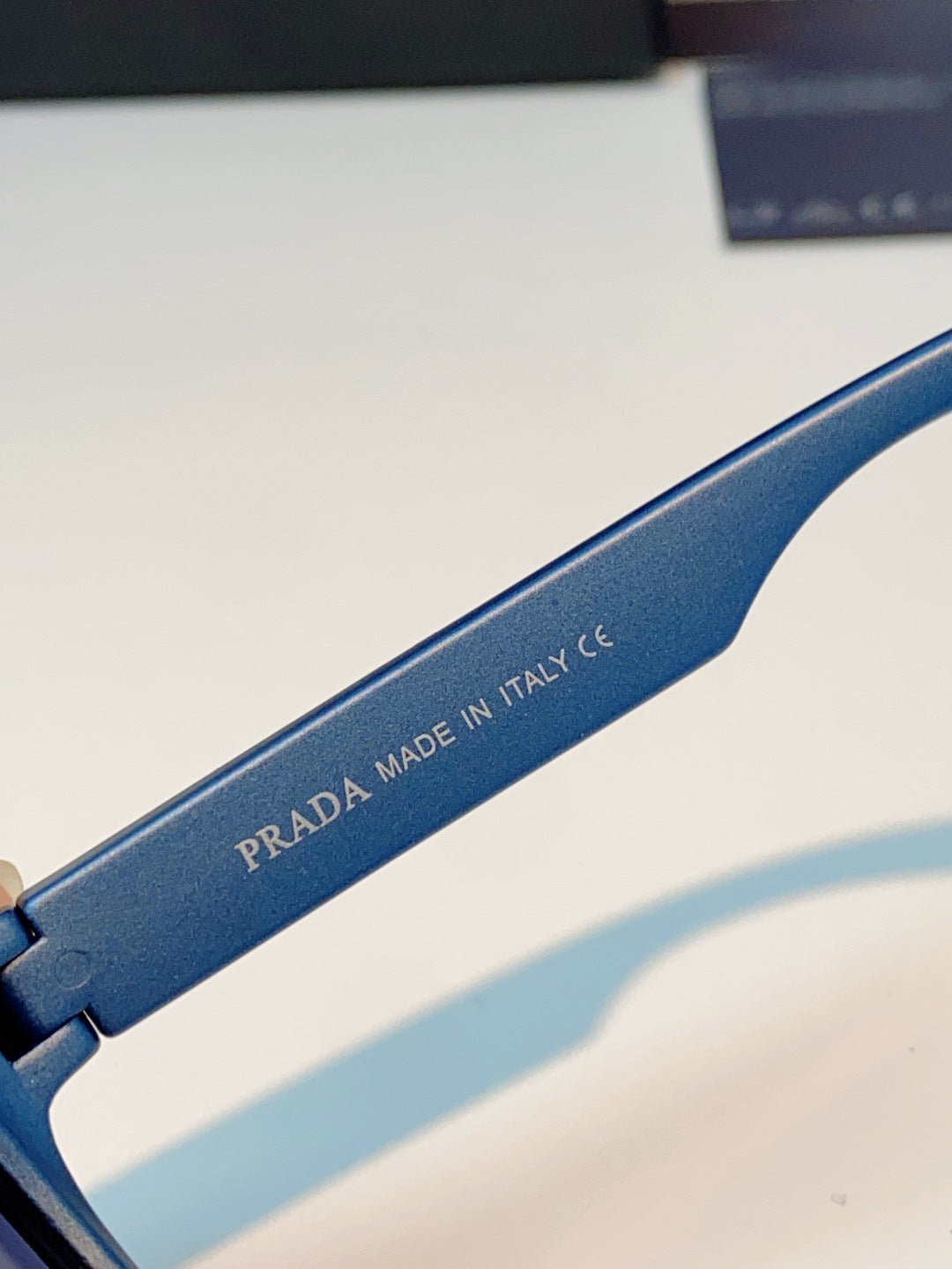 Prada Cat-Eye Blue Lens Sunglasses for Men & Women - detail image 8