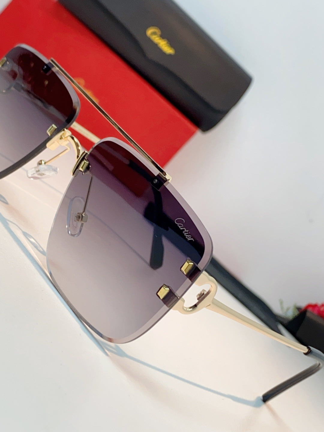 Cartier Lightweight Metal Rimless Gray Lens Sunglasses for Men & Women - detail image 7