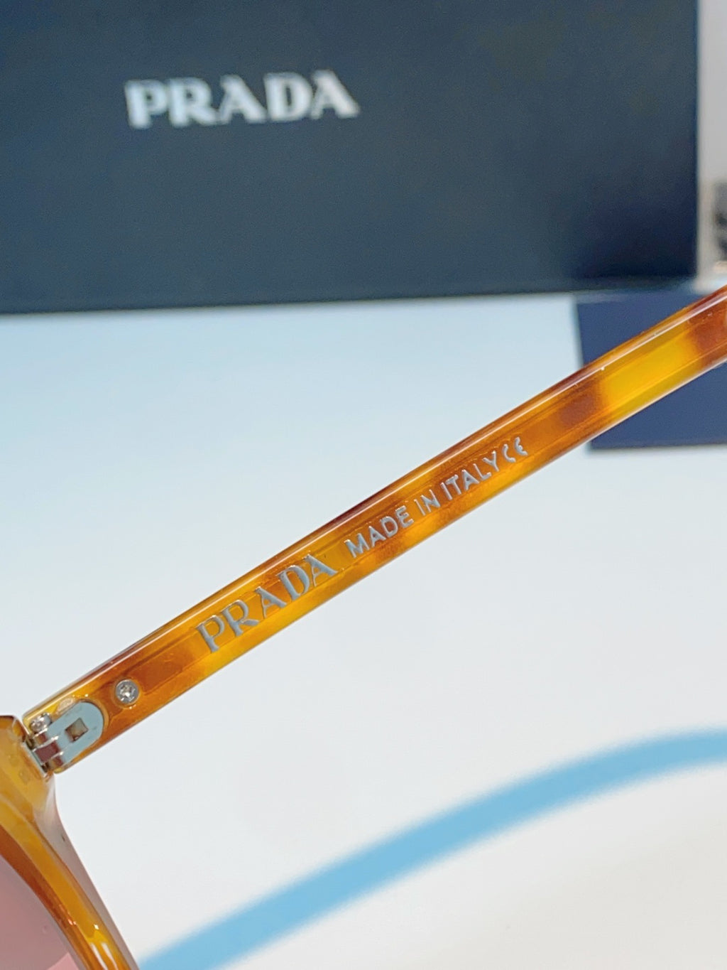 Prada Cat-Eye Orange Lens Sunglasses for Men & Women - detail image 8