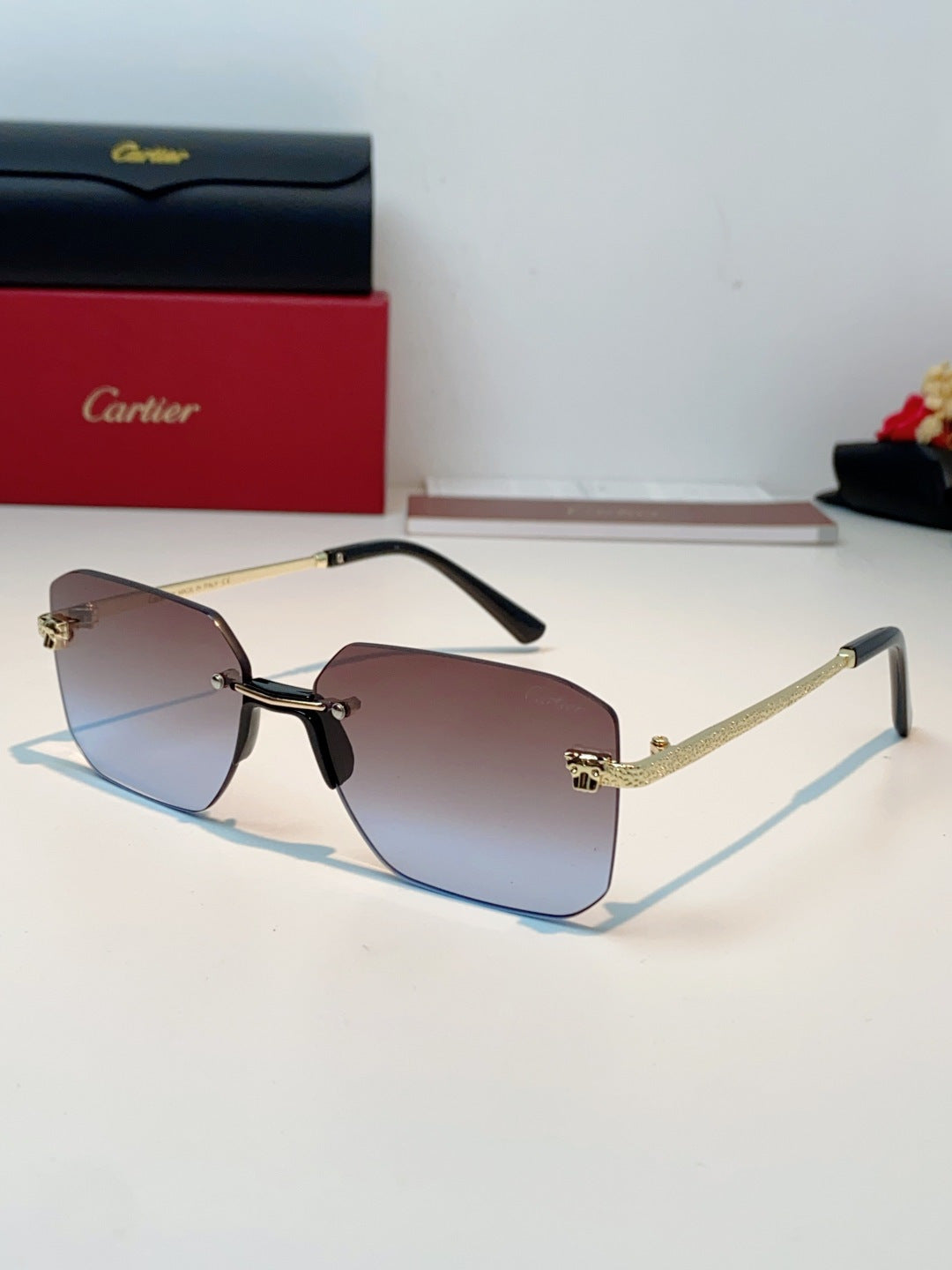 Cartier Lightweight Rimless Red Lens Sunglasses for Men & Women - 158510