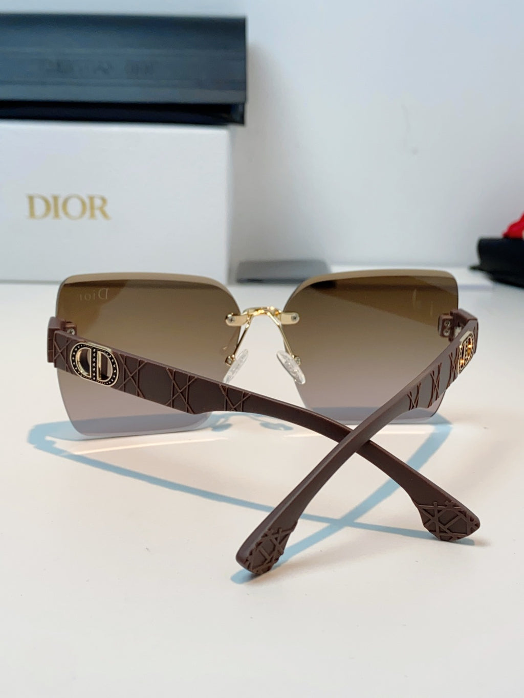 Dior Lightweight Rimless Brown Lens Sunglasses for Men & Women - detail image 3