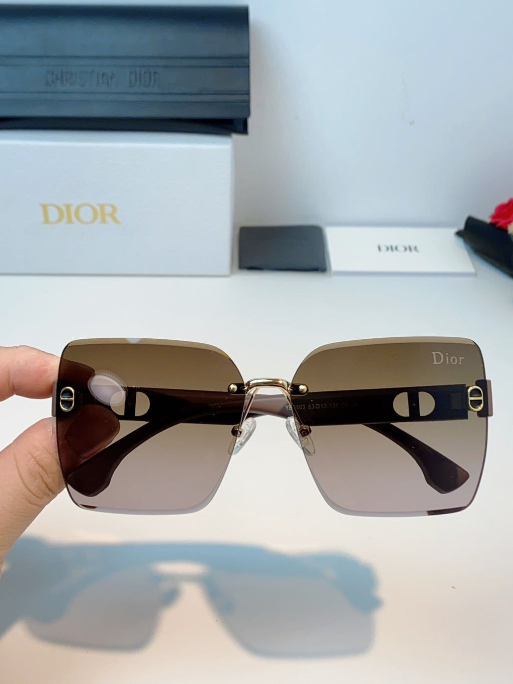 Dior Lightweight Rimless Brown Lens Sunglasses for Men & Women - detail image 4