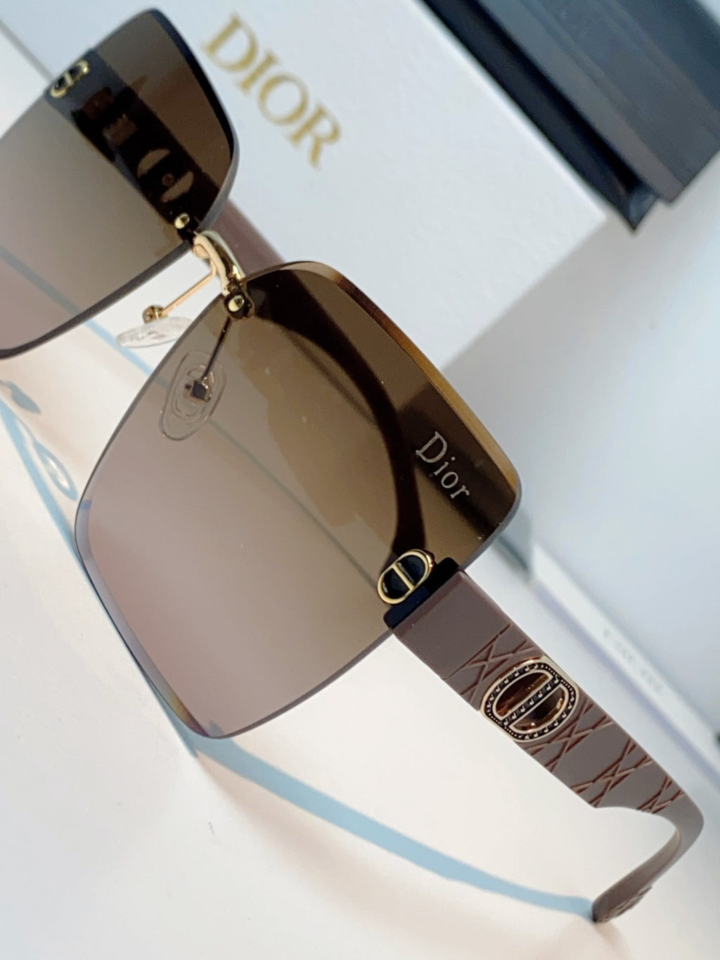 Dior Lightweight Rimless Brown Lens Sunglasses for Men & Women - detail image 7