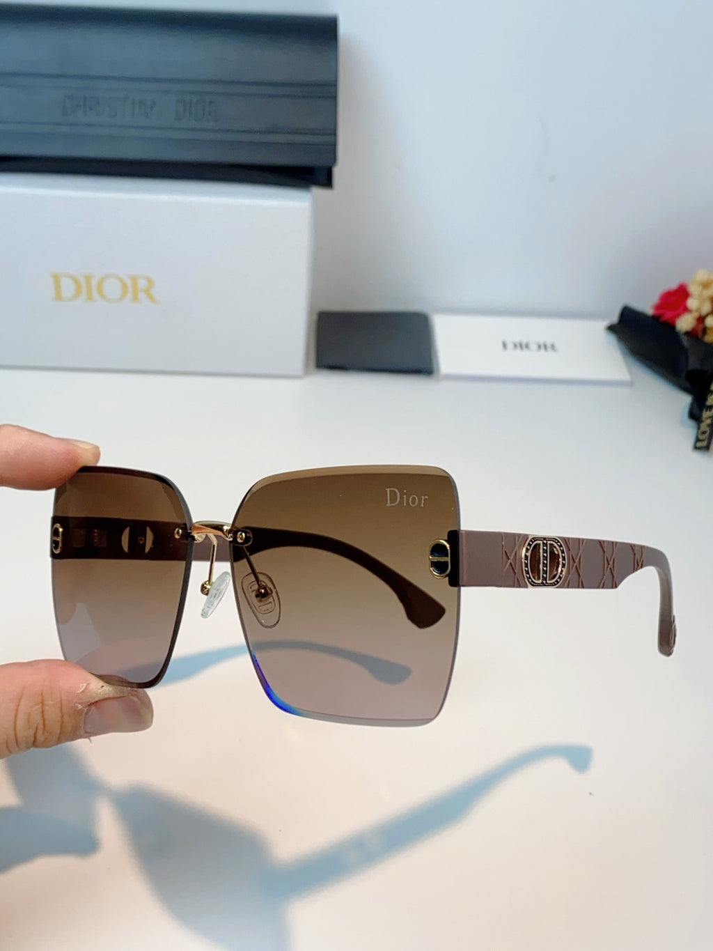 Dior Lightweight Rimless Brown Lens Sunglasses for Men & Women - detail image 6