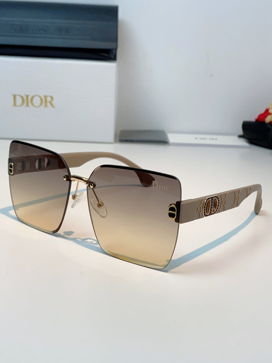 Dior Lightweight Rimless Gold Lens Sunglasses for Men & Women