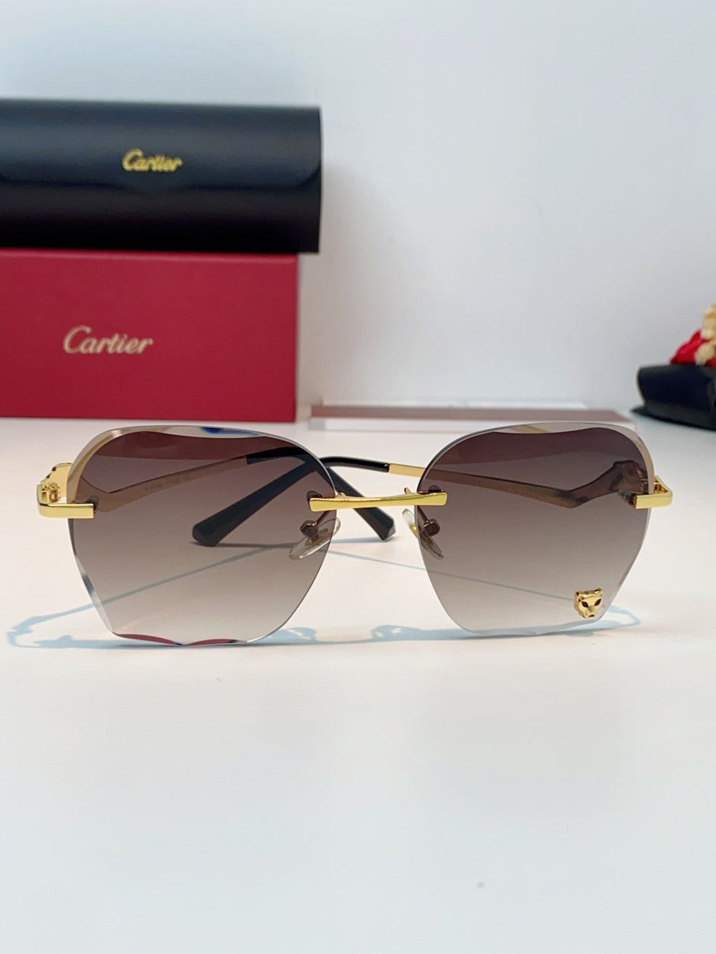 Cartier Photochromic Rimless Red Lens Sunglasses for Men & Women - 372219 - detail image 2