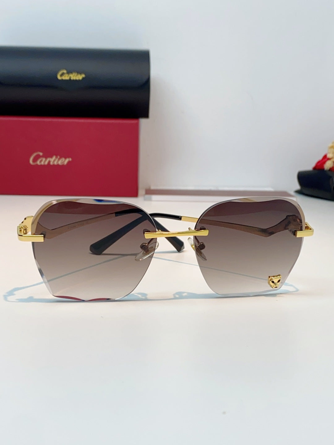 Cartier Photochromic Rimless Red Lens Sunglasses for Men & Women - 372219 - detail image 2