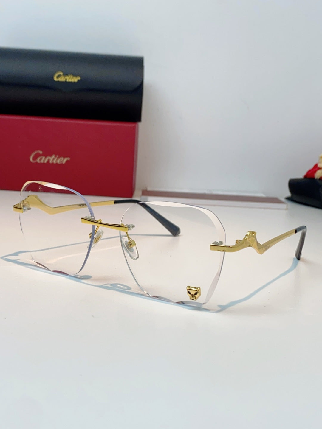 Cartier Photochromic Rimless Orange Lens Sunglasses for Men & Women