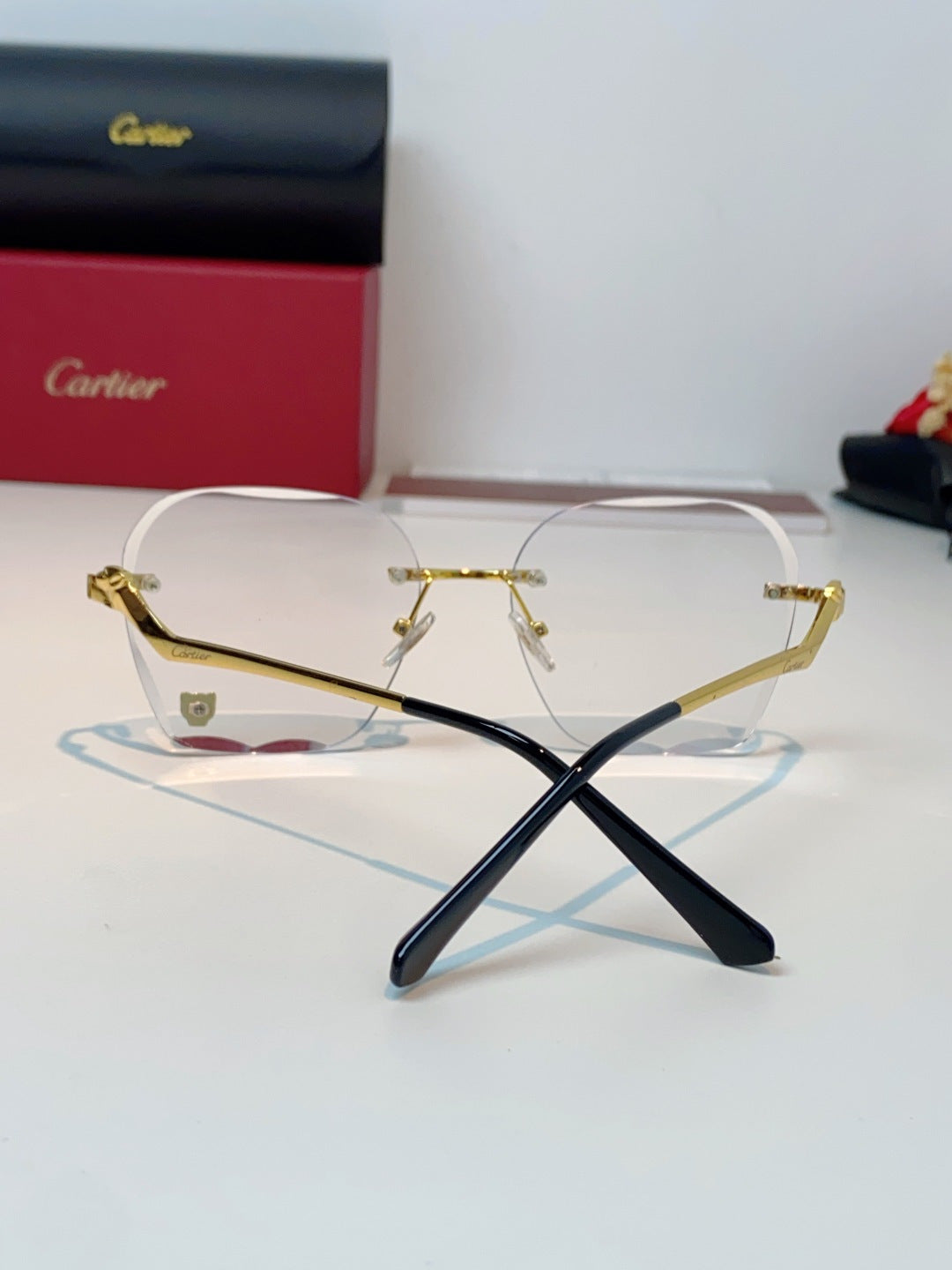 Cartier Photochromic Rimless Orange Lens Sunglasses for Men & Women - detail image 3