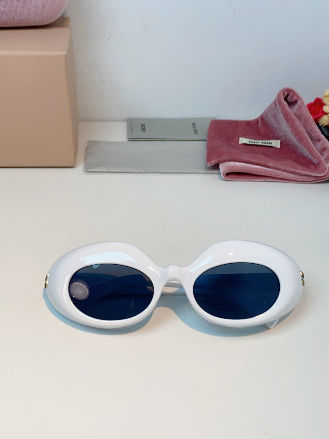 Miu Miu Metal Cat-Eye Blue Lens Sunglasses for Women - detail image 9
