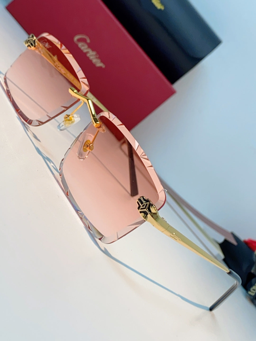 Cartier Lightweight Rimless Pink Lens Sunglasses for Men & Women - detail image 7