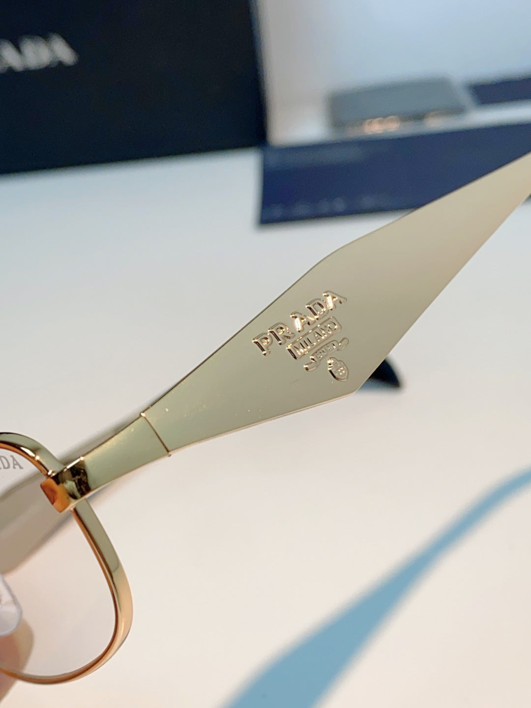 Prada Metal Oval Gold Lens Sunglasses for Men & Women - detail image 8