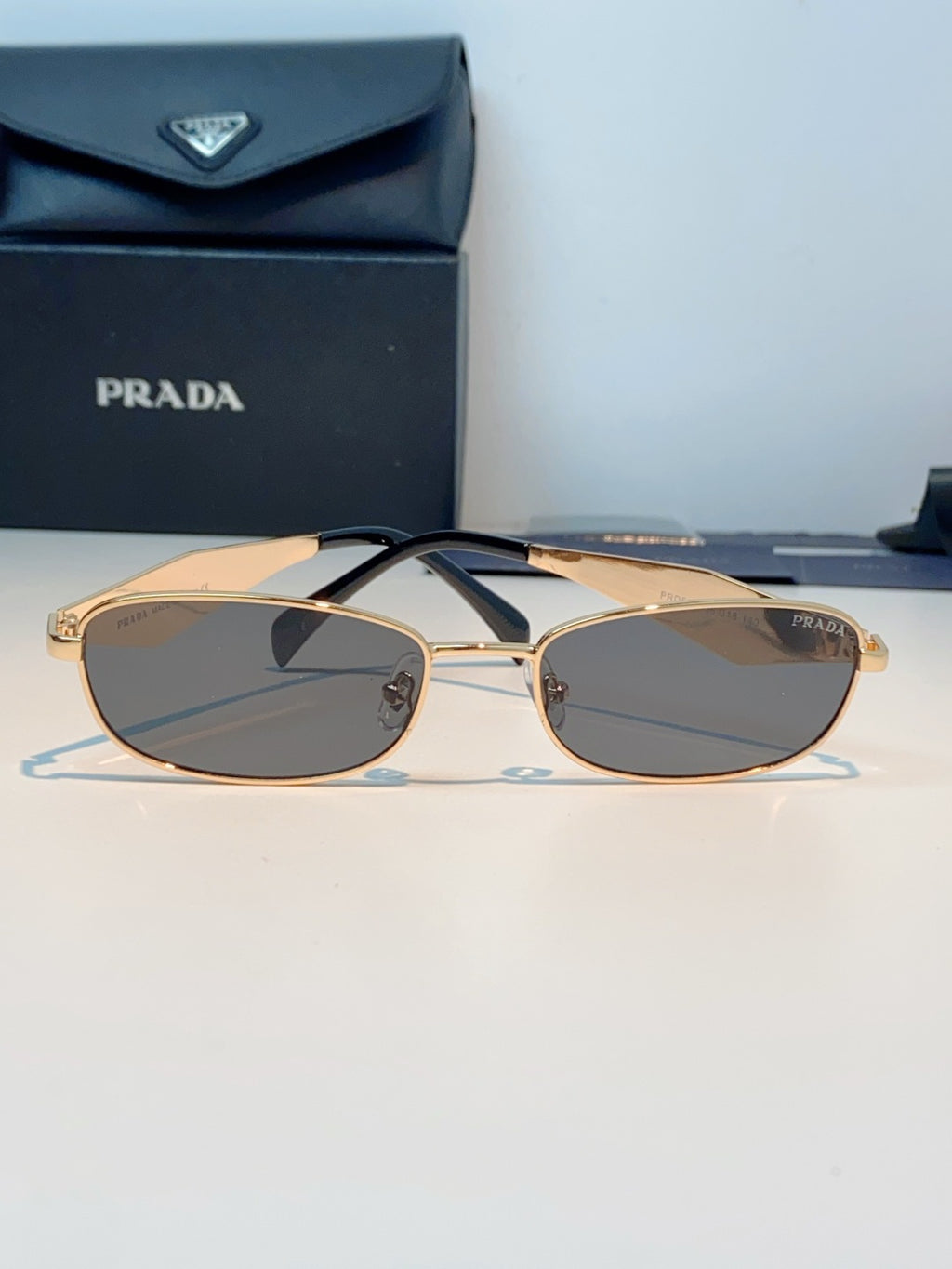 Prada Metal Oval Brown Lens Sunglasses for Men & Women - detail image 2