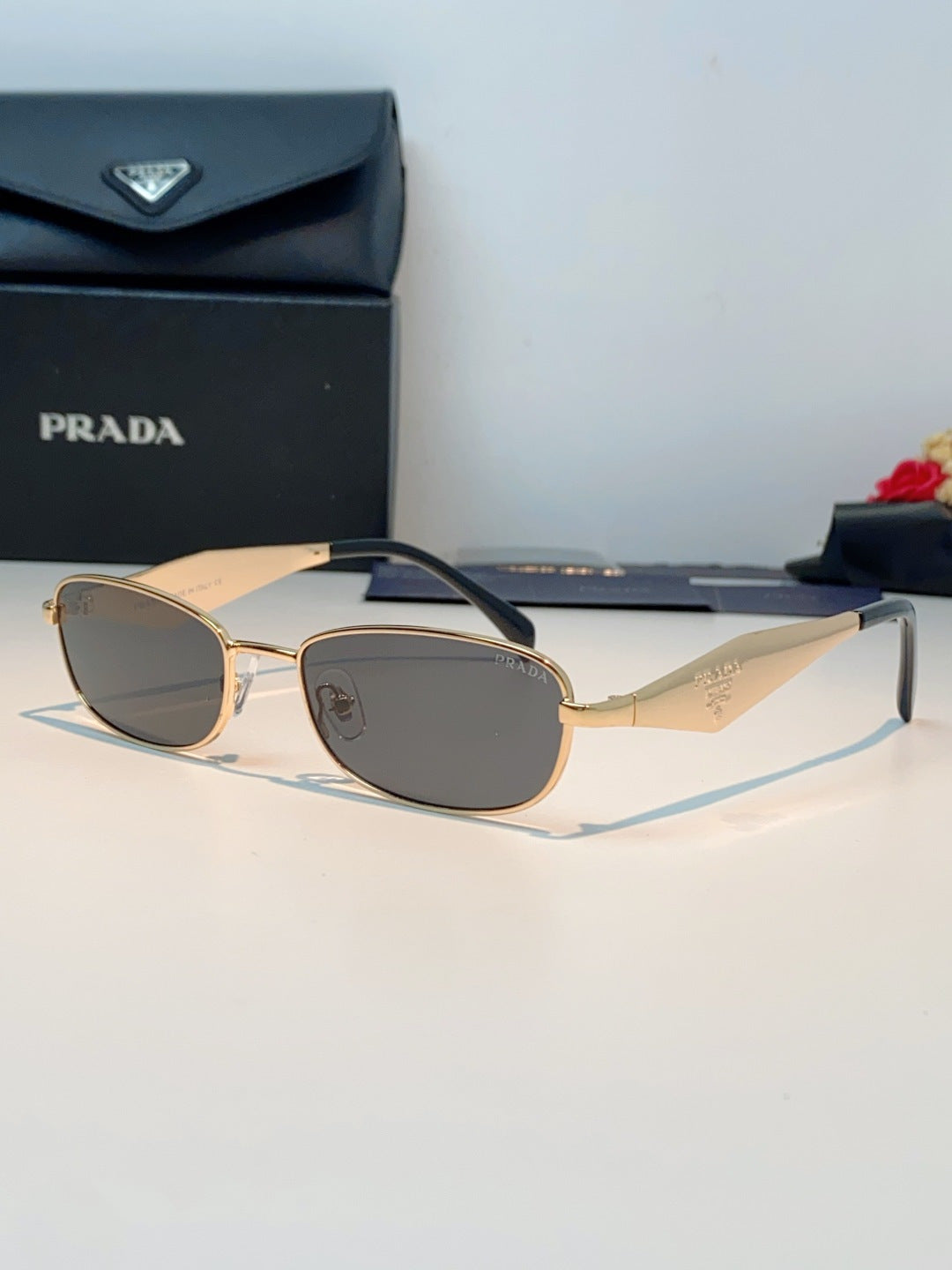 Prada Metal Oval Brown Lens Sunglasses for Men & Women