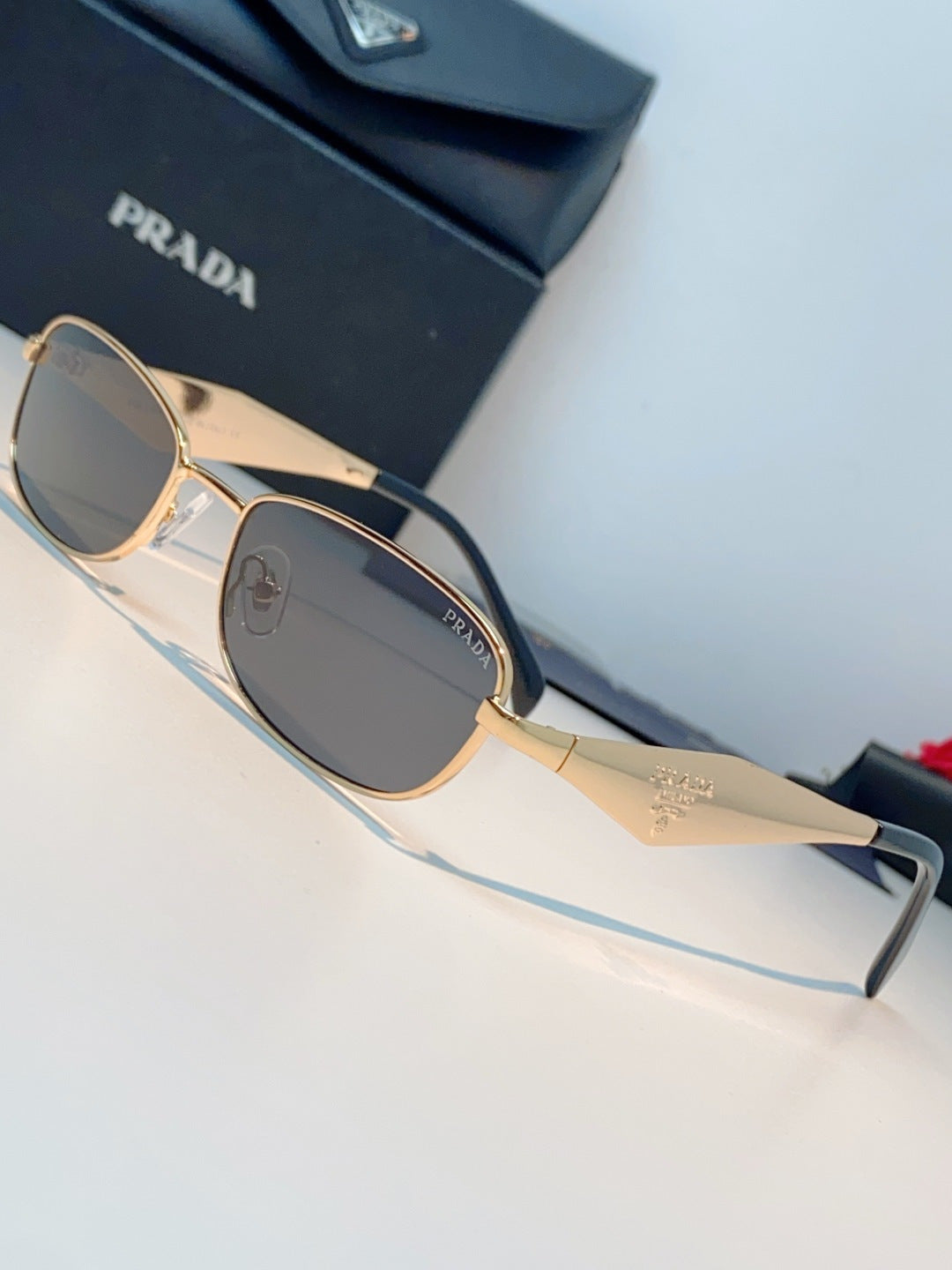 Prada Metal Oval Brown Lens Sunglasses for Men & Women - detail image 7