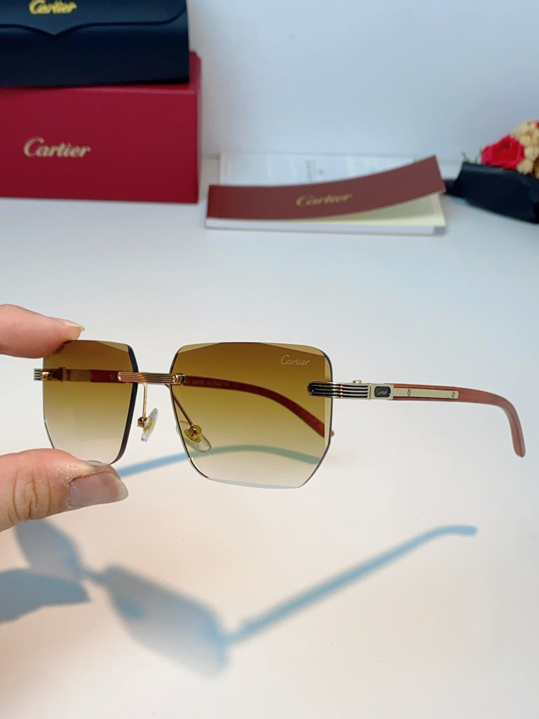 Cartier Lightweight Metal Rimless Orange Lens Sunglasses for Men & Women - detail image 6