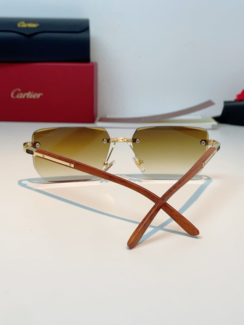 Cartier Lightweight Metal Rimless Orange Lens Sunglasses for Men & Women - detail image 3