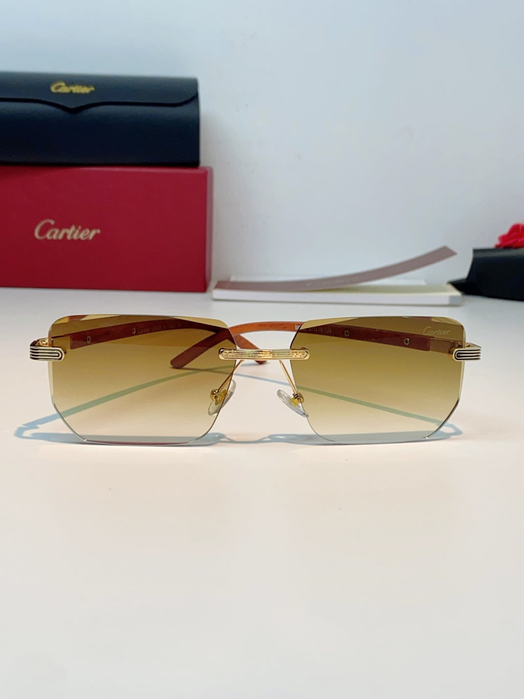 Cartier Lightweight Metal Rimless Orange Lens Sunglasses for Men & Women - detail image 2
