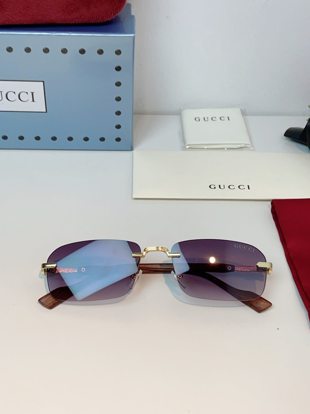 Gucci Lightweight Metal Rimless Red Lens Sunglasses for Men & Women - detail image 10
