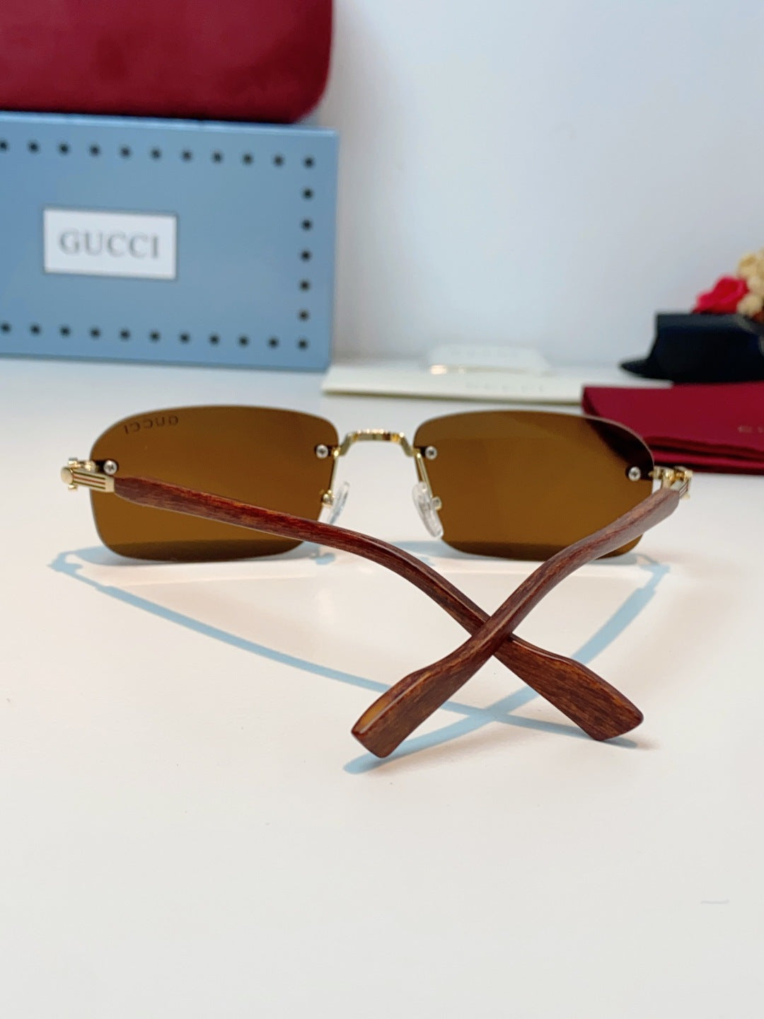 Gucci Lightweight Metal Rimless Brown Lens Sunglasses for Men & Women - detail image 3