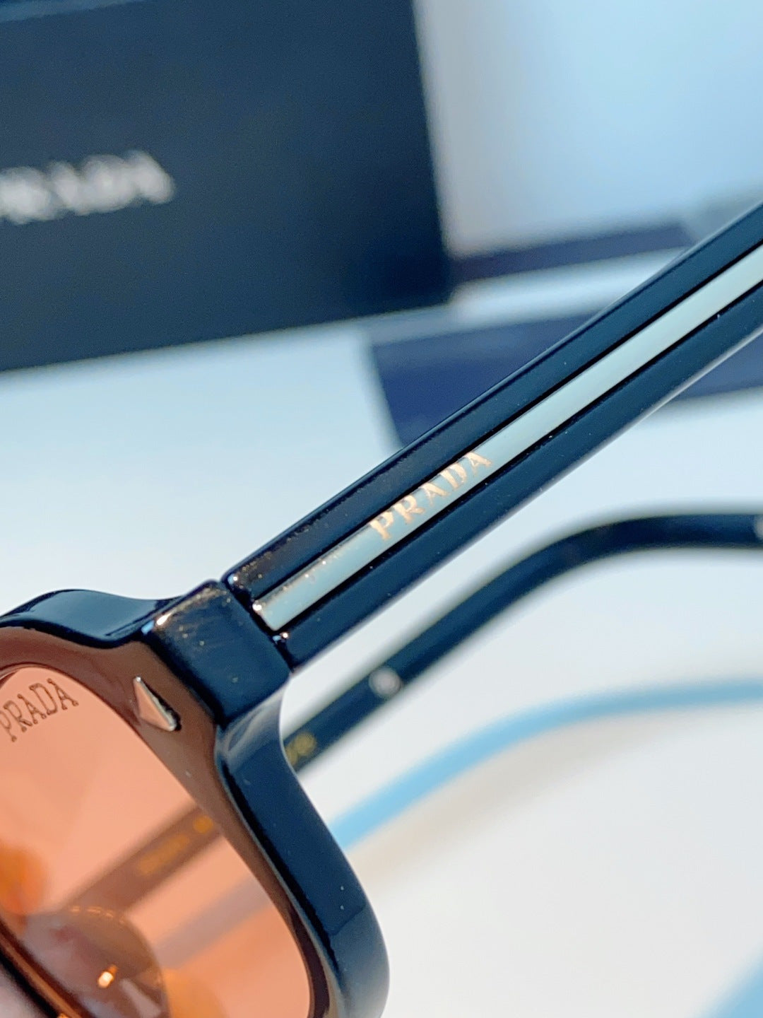 Prada Metal Oval Red Lens Sunglasses for Men & Women - detail image 8