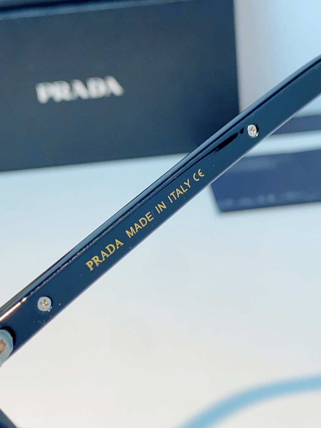 Prada Metal Oval Red Lens Sunglasses for Men & Women - detail image 9